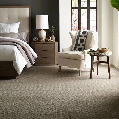 Bedroom With Brown Carpeting and White Accents